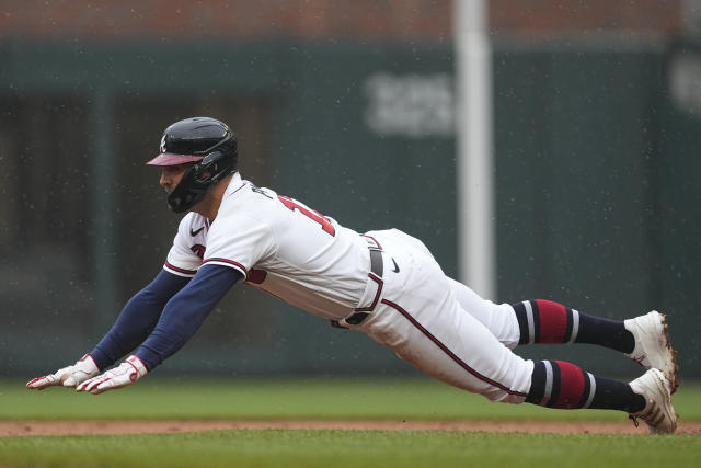 Marlins rally in ninth, stun Braves 5-4 to avoid sweep