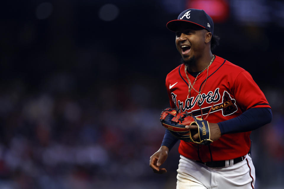 Atlanta Braves second baseman Ozzie Albies runs off the field after a double play during the third inning of the team's baseball game against the Houston Astros, Friday, April 21, 2023, in Atlanta. (AP Photo/Butch Dill)