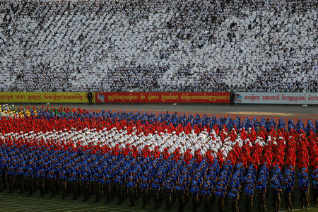 Cambodians attend an event to mark the 40th anniversary of the toppling of Pol Pot's Khmer Rouge regime at the Olympic stadium in Phnom Penh, Cambodia, January 7, 2019. REUTERS/Samrang Pring