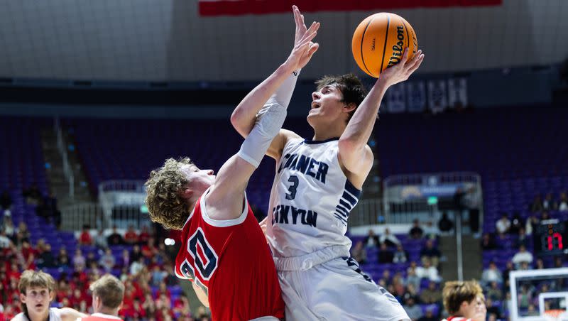 Corner Canyon’s Jaxson Roberts (3) lays the ball up during the 6A boys basketball finals at the Dee Events Center at Weber State in Ogden on Mar. 4, 2023.