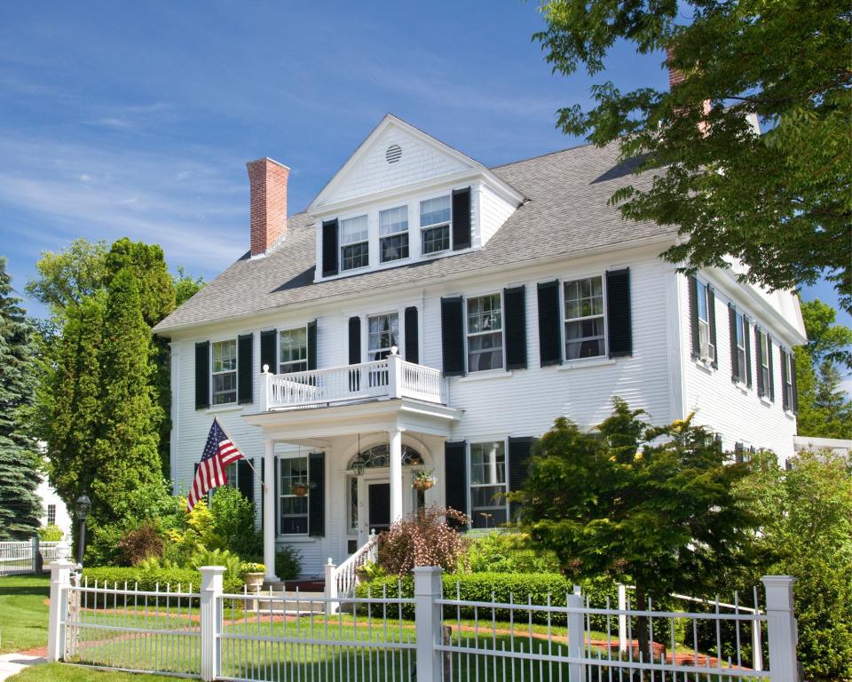 American flag hung outside house