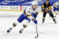 FILE - In this March 11, 2021, file photo, Buffalo Sabres forward Dylan Cozens (24) skates with the puck during the second period of an NHL hockey game against the Pittsburgh Penguins in Buffalo, N.Y. (AP Photo/Jeffrey T. Barnes, File)