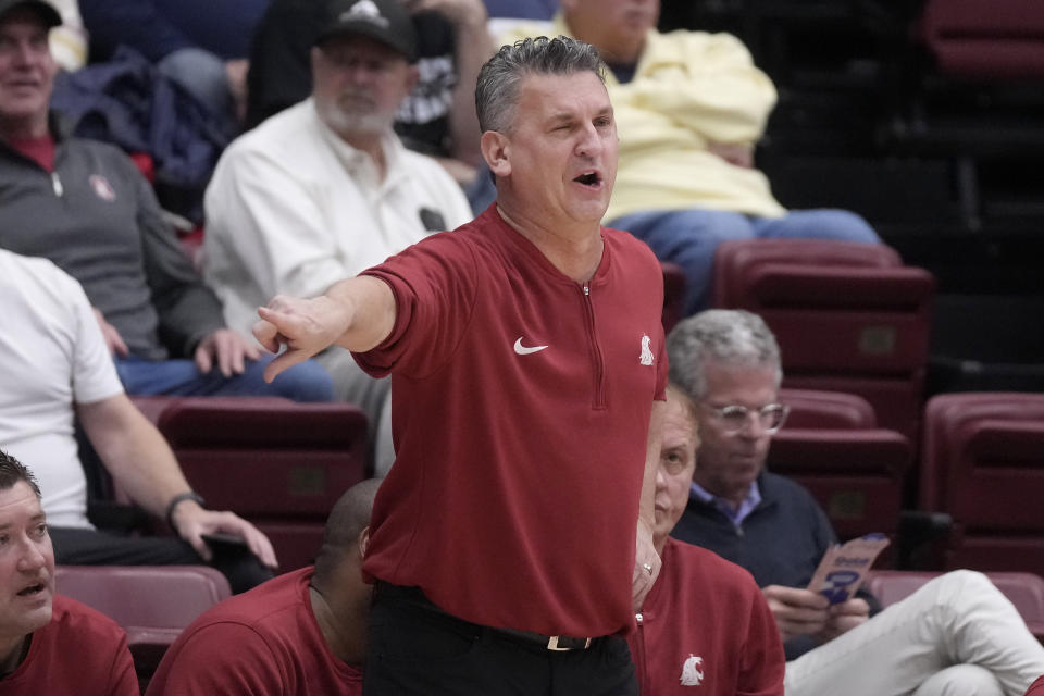 Washington State head coach Kyle Smith gestures to players during the first half of the team's NCAA college basketball game against Stanford in Stanford, Calif., Thursday, Jan. 18, 2024. (AP Photo/Jeff Chiu)