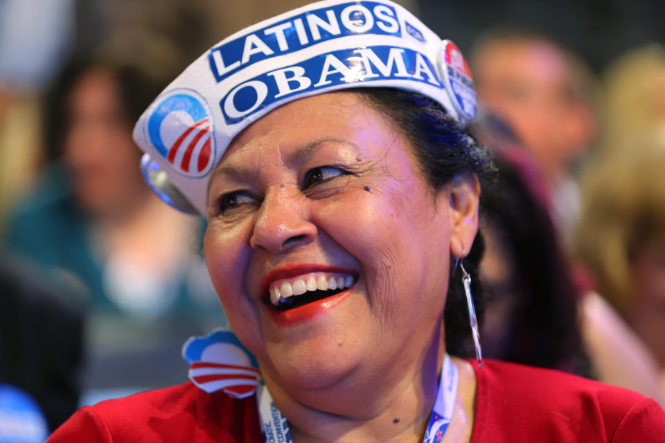 Delegate Antonia Gonzalez of Seattle, WA wears a Latinos for Obama hat during day one of the Democratic National Convention at Time Warner Cable Arena on September 4, 2012 in Charlotte, North Carolina. (Photo by Joe Raedle/Getty Images)