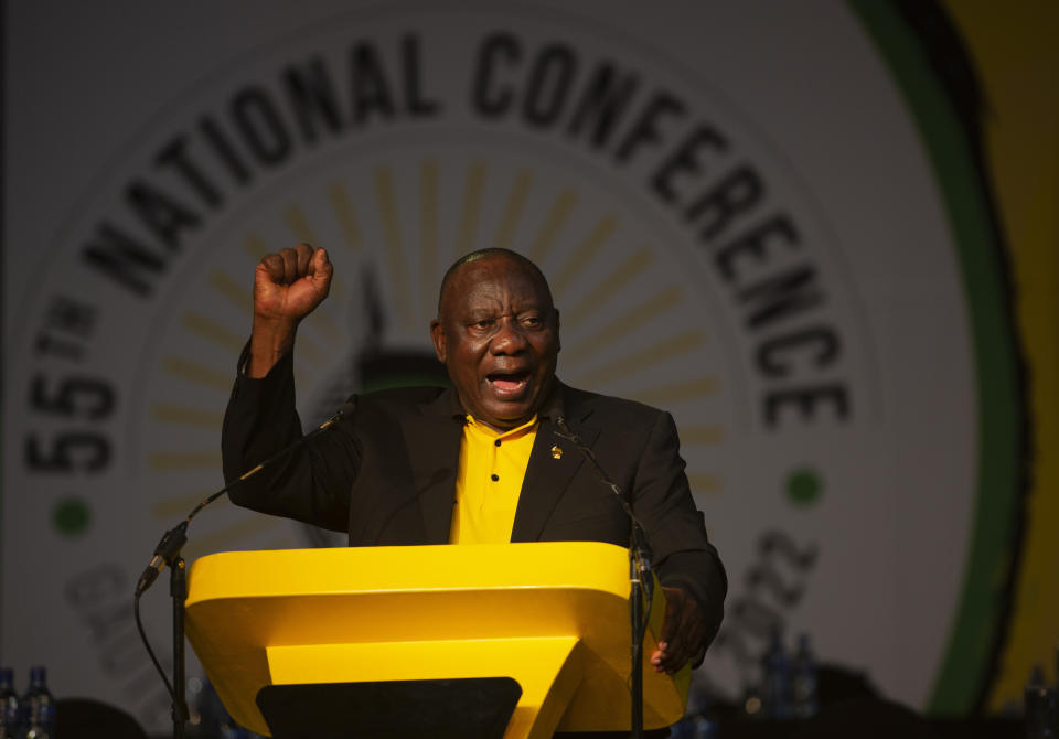 President of the African National Congress Cyril Ramaphosa gives a black power salute at the end of the 55th National Conference in Johannesburg, South Africa, Tuesday, Dec. 20, 2022. (AP Photo/Denis Farrell)