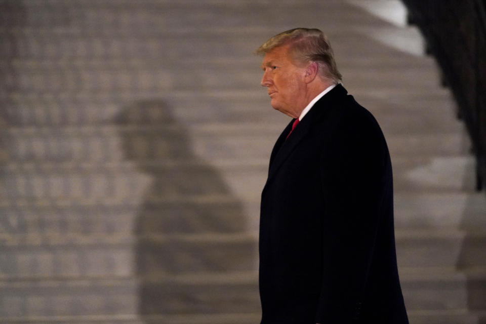 President Donald Trump arrives on the South Lawn of the White House, Tuesday, Jan. 12, 2021, in Washington. The president was returning from Texas. (AP Photo/Gerald Herbert)