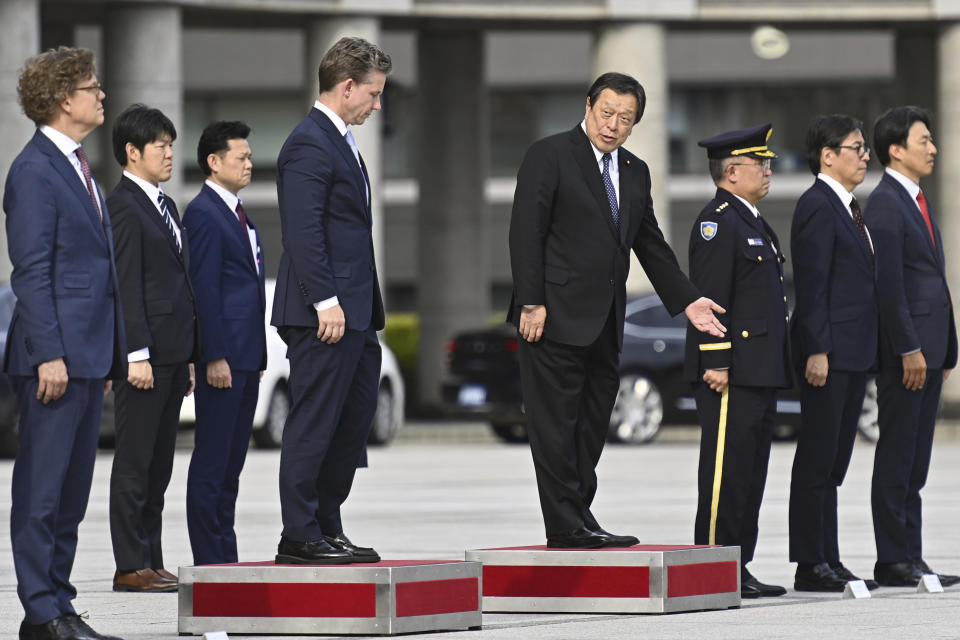 Sweden's Defense Minister Pal Jonson, center left, attends an honor guard ceremony, with Japanese Defense Minister Yasukazu Hamada, center right, ahead their bilateral meeting at the Defense Ministry Wednesday, June 7, 2023, in Tokyo, Japan. (David Mareuil/Pool Photo via AP)