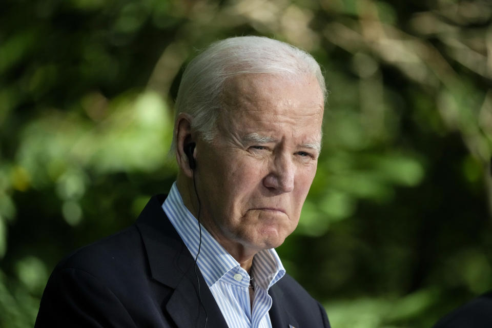 FILE - President Joe Biden listens during a joint news conference with South Korea's President Yoon Suk Yeol and Japan's Prime Minister Fumio Kishida on Friday, Aug. 18, 2023, at Camp David, the presidential retreat, near Thurmont, Md. (AP Photo/Andrew Harnik, File)