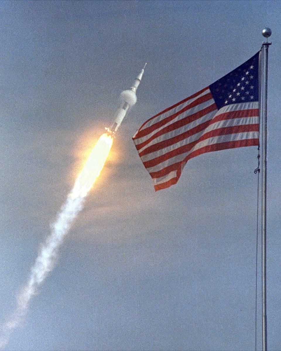 <div class="inline-image__caption"><p>The American flag heralded the launch of Apollo 11, the first Lunar landing mission. Four days later, on July 20, Armstrong and Aldrin landed on the Moon's surface.</p></div> <div class="inline-image__credit">Courtesy of NASA</div>