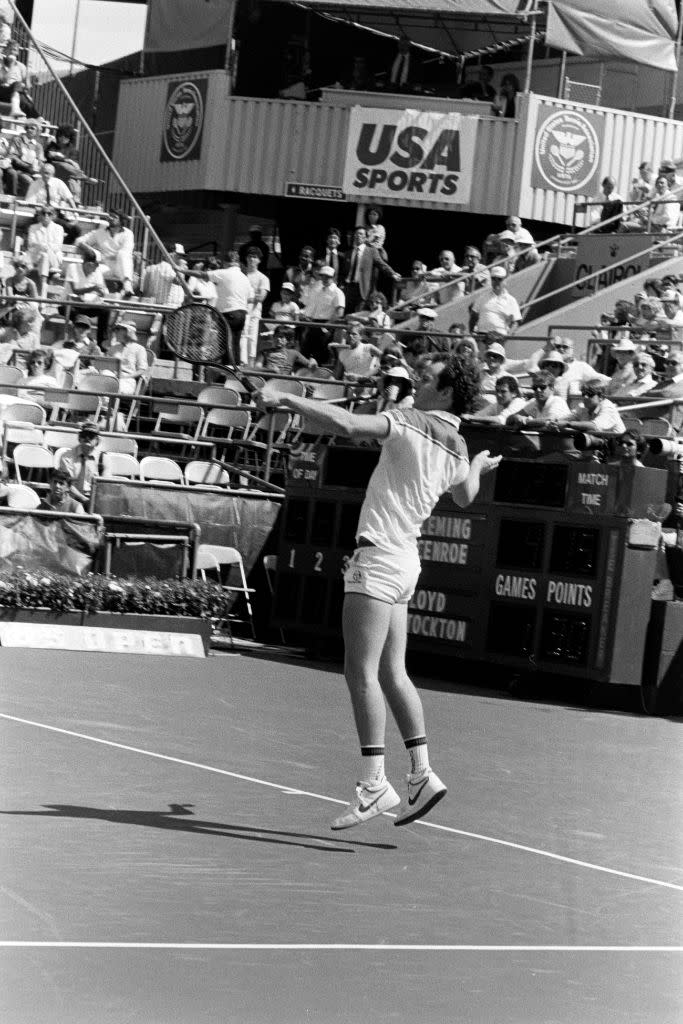 John McEnroe in NIkes at the U.S. Open, September 5, 1984. - Credit: Fairchild Publishing