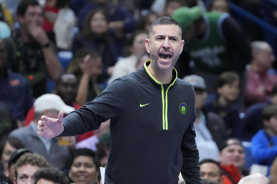 New Orleans Pelicans acting head coach James Borrego calls out from the bench in the first half of an NBA basketball game against the Dallas Mavericks in New Orleans, Tuesday, Nov. 14, 2023. (AP Photo/Gerald Herbert)