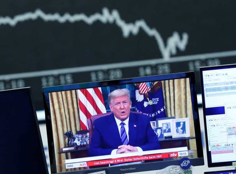 A television broadcast showing U.S. President Donald Trump is pictured during a trading session at Frankfurt's stock exchange in Frankfurt