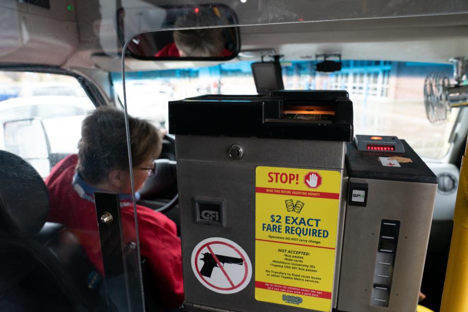 A machine currently only accepts cash for the $2 fare to ride on a Topeka Transit MOD bus but will soon allow for other forms of payment.