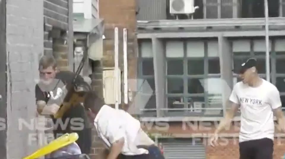 The two men faced court on Tuesday while a third is being sought following an alleged assault with a chainsaw in inner Sydney. Source: 7 News