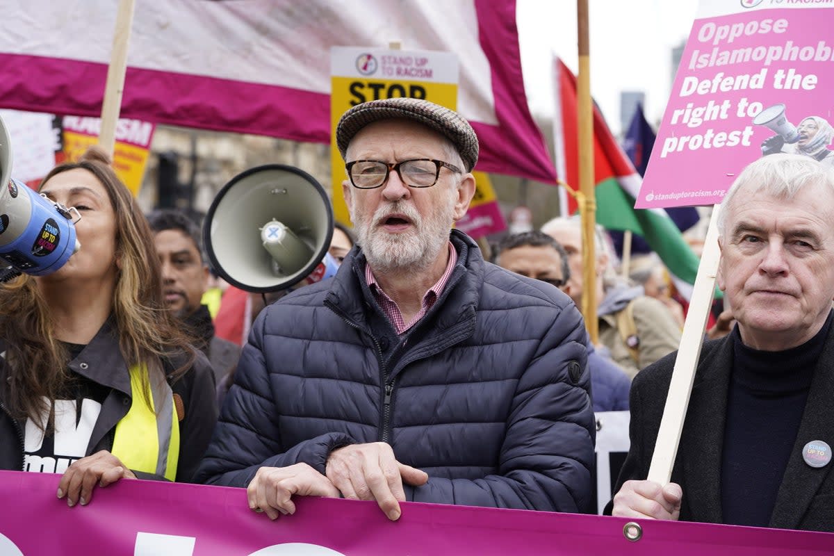 Former Labour Party leader Jeremy Corbyn and ex-shadow chancellor John McDonnell at the protest  (PA Wire)