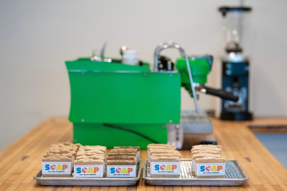 Branded soap sits on the counter inside their soon-to-open doughnut shop Curiosity Doughnuts in Doylestown on Wednesday, Jan. 25, 2023.