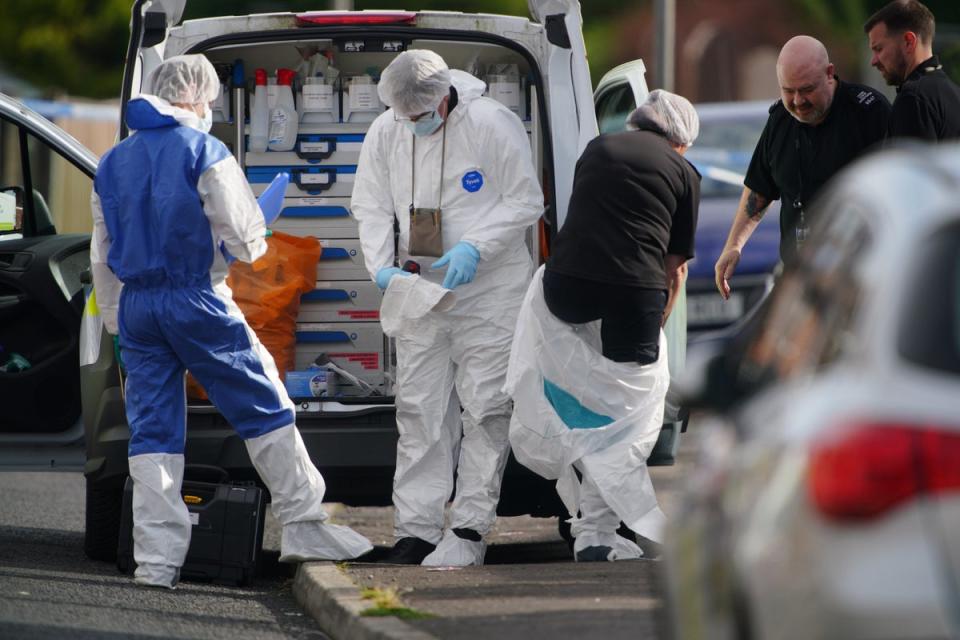 Forensic officers near to the scene in Kingsheath Avenue, Knotty Ash, Liverpool (Peter Byrne/PA) (PA Wire)