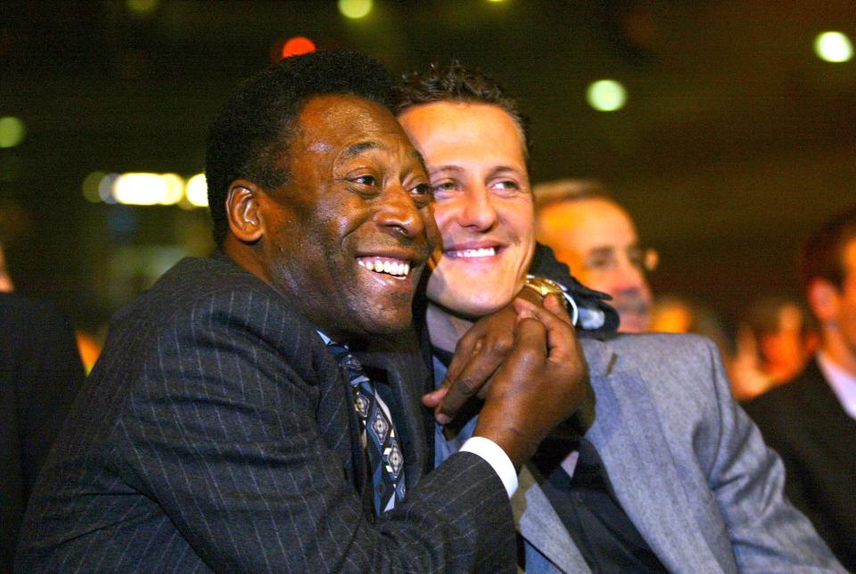 Pele and Michael Schumacher fool around at the Preliminary  Draw in Frankfurt  for the 2006 World Cup