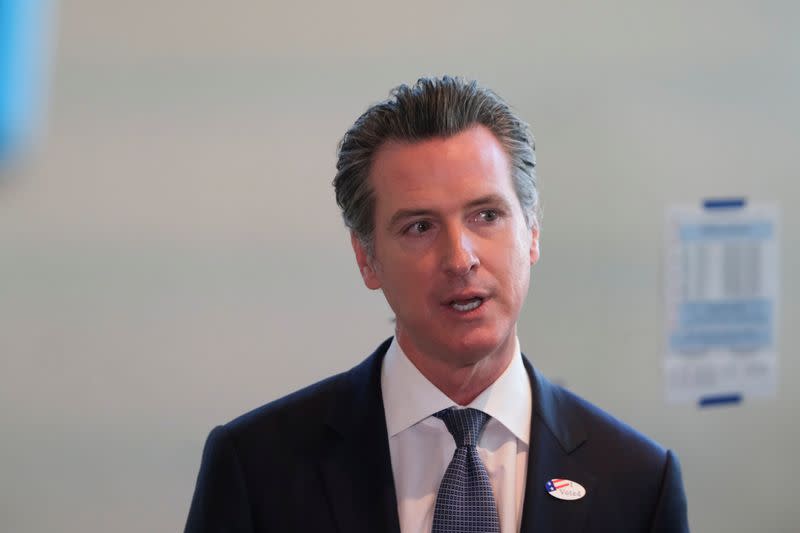 California's Governor Gavin Newsom speaks to the media after casting his vote at a voting center at The California Museum for the presidential primaries on Super Tuesday in Sacramento