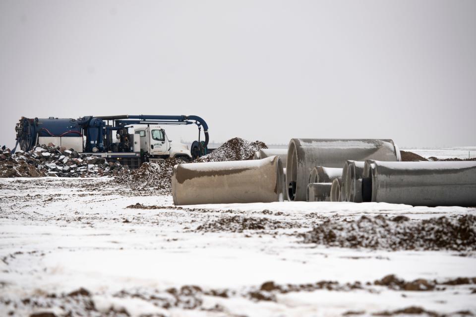 Work continues at the Kinston development site east of Interstate 25 on Thursday.