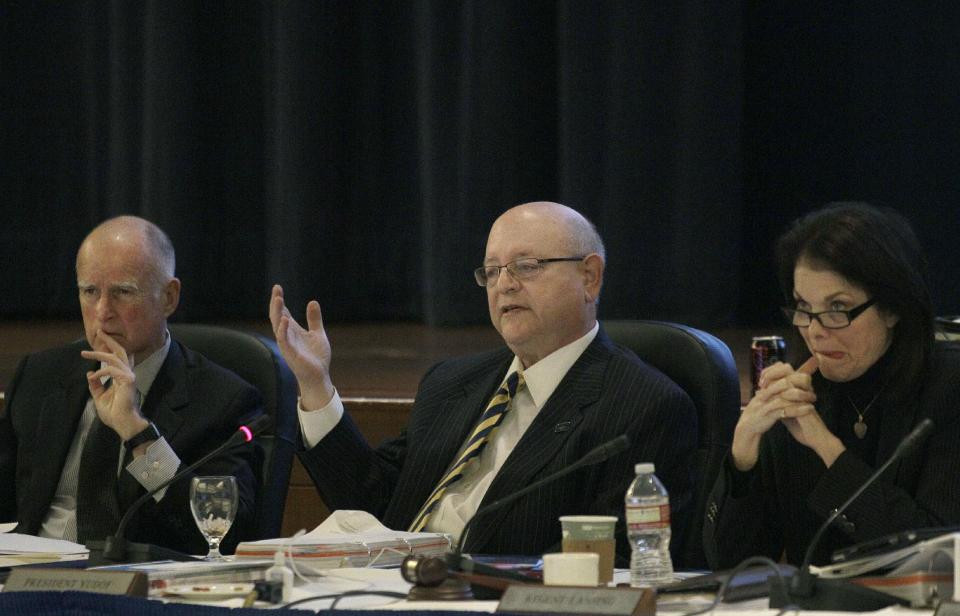 University of California President Mark Yudof, center, speaks next to Gov. Jerry Brown, left, and the UC Regents chair Sherry Lansing at the UC Board of Regents meeting in San Francisco, Wednesday, Nov. 14, 2012. (AP Photo/Jeff Chiu)