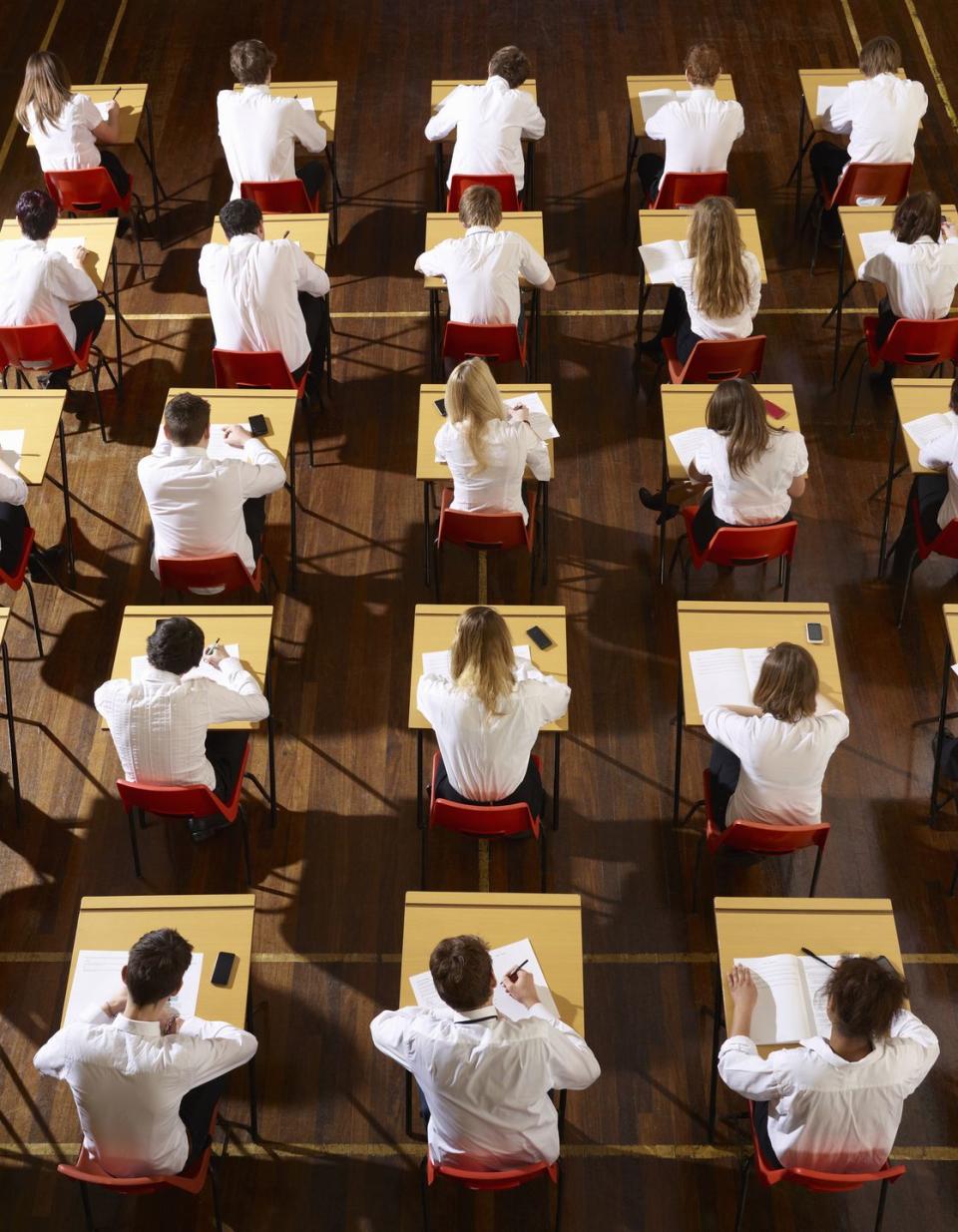 a group of people sitting in chairs