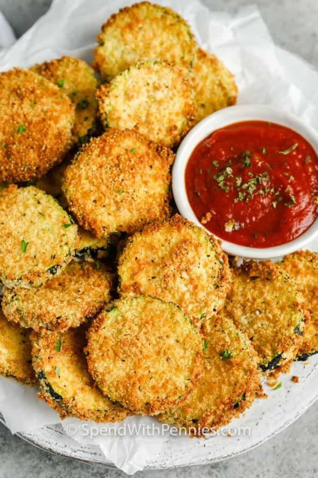 <p>Spend With Pennies</p><p>So tasty the kids won't even notice they are eating their vegetables.</p><p><strong>Get the recipe: <a href="https://www.spendwithpennies.com/air-fryer-zucchini-chips/" rel="nofollow noopener" target="_blank" data-ylk="slk:Air Fryer Zucchini Chips;elm:context_link;itc:0;sec:content-canvas" class="link ">Air Fryer Zucchini Chips</a></strong></p>