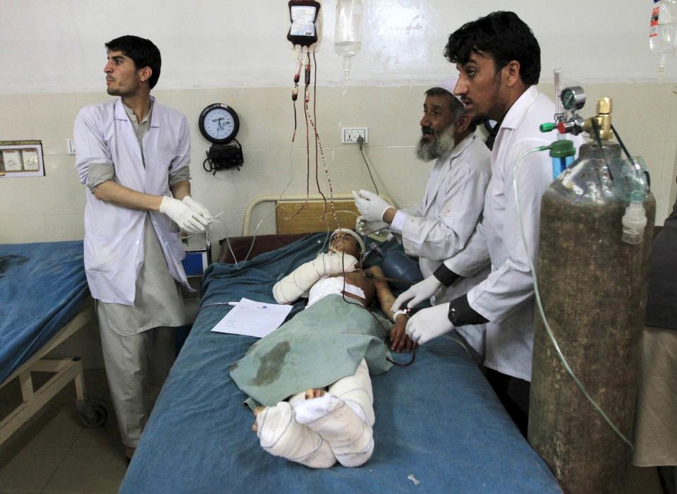 A boy receives treatment at a hospital after a suicide attack in Jalalabad April 18, 2015. (REUTERS/Parwiz)