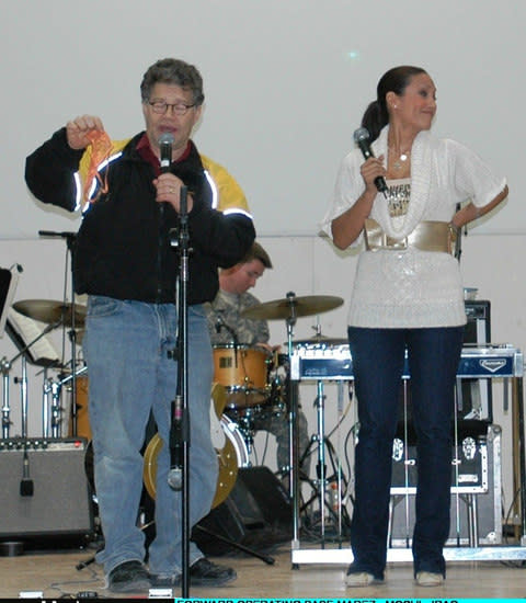 Al Franken and Leann Tweeden entertain the Soldiers with a skit at Forward Operating Base Marez in Mosul, Iraq on December 16, 2006. Tweeden accused Sen. Al Franken (D-VT) of groping and kissing her with out consent while they were on a USO Tour together in 2006 - Credit: Getty