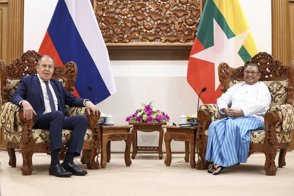 In this handout photo released by the Russian Foreign Ministry Press Service, Myanmar Foreign Minister Wunna Maung Lwin, right, and Russian Foreign Minister Sergey Lavrov pose for a photo prior to their talks in Naypyitaw, Myanmar, Wednesday, Aug. 3, 2022. (Russian Foreign Ministry Press Service via AP)