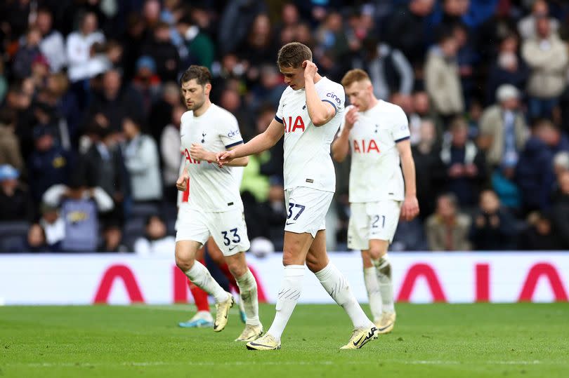 Micky van de Ven of Tottenham Hotspur looks dejected