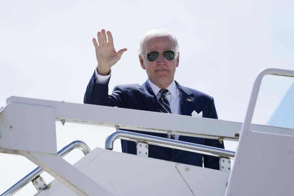 President Joe Biden waves before boarding Air Force One at Madrid's Torrejon Airport, Thursday, June 30, 2022. Biden is returning to Washington after attending the Group of Seven summit in Germany and the NATO summit in Spain. (AP Photo/Susan Walsh)