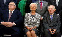 (L-R) Mexico's Finance Minister Agustin Carstens, IMF Managing Director Christine Lagarde, and German Finance Minister Wolfgang Schauble look up at the official photographer for a "family" photo for the International Monetary and Financial Committee (IMFC), as part of the IMF and World Bank's 2017 Annual Spring Meetings, in Washington, U.S., April 22, 2017. REUTERS/Mike Theiler