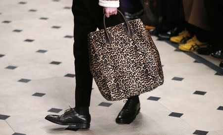 A model presents a creation from the Burberry Prorsum Autumn/Winter 2015 collection during "London Collections: Men" in London January 12, 2015. REUTERS/Suzanne Plunkett