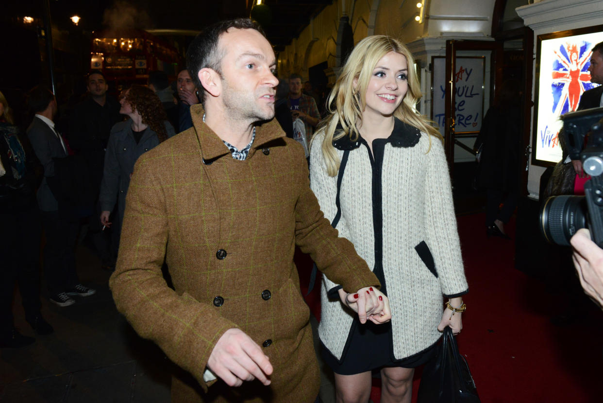 LONDON, ENGLAND - DECEMBER 11: Holly Willoughby and Dan Baldwin attend the 