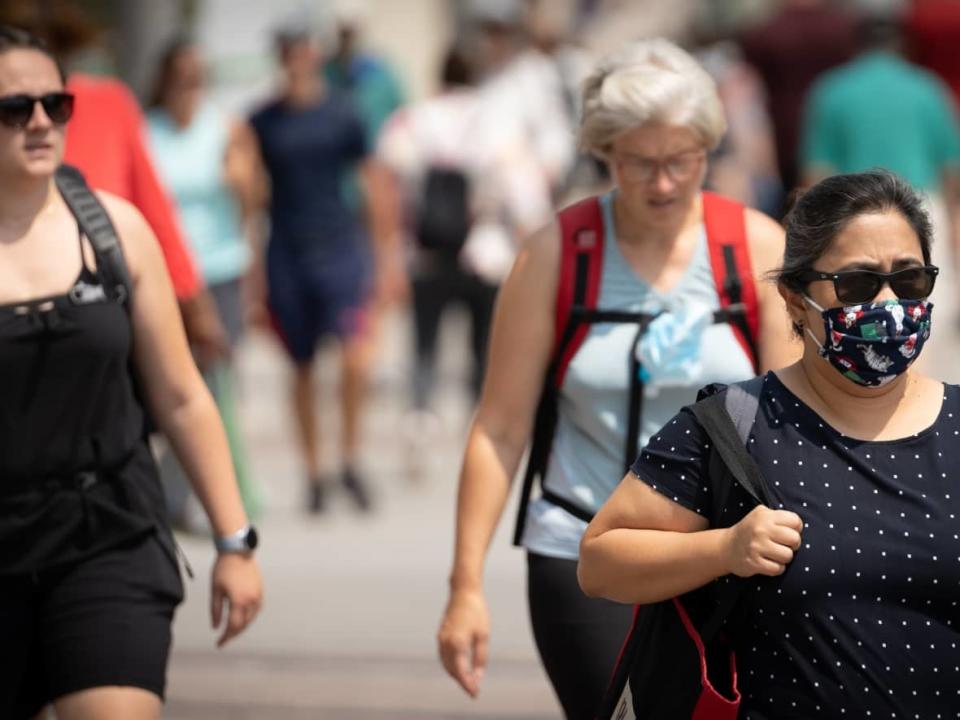 These days fewer people are wearing masks and life is largely back to normal in Ottawa but the pandemic hasn't ended, said Ottawa's medical officer of health on Tuesday.  (Brian Morris/CBC - image credit)
