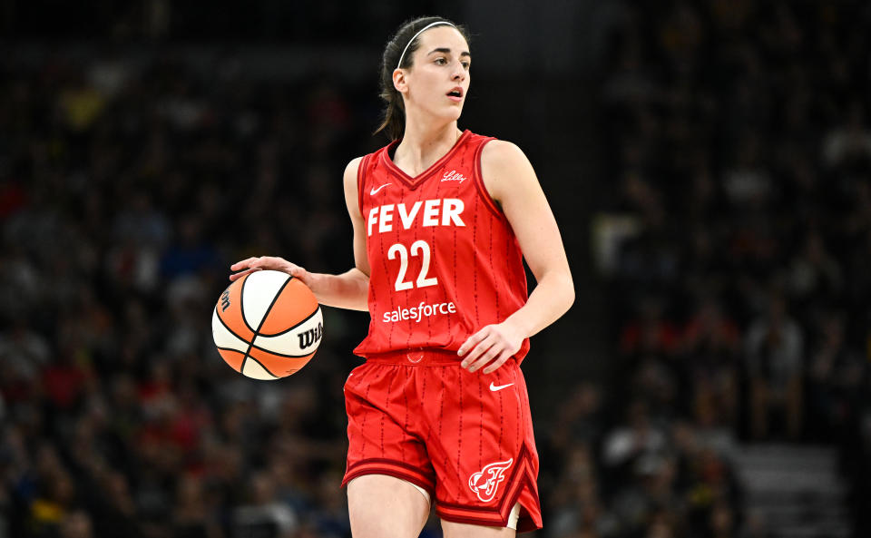 MINNEAPOLIS, MINNESOTA - AUGUST 24: Caitlin Clark #22 of the Indiana Fever dribbles the ball in the first quarter of the game against the Minnesota Lynx at Target Center on August 24, 2024 in Minneapolis, Minnesota. NOTE TO USER: User expressly acknowledges and agrees that, by downloading and or using this photograph, User is consenting to the terms and conditions of the Getty Images License Agreement. (Photo by Stephen Maturen/Getty Images)