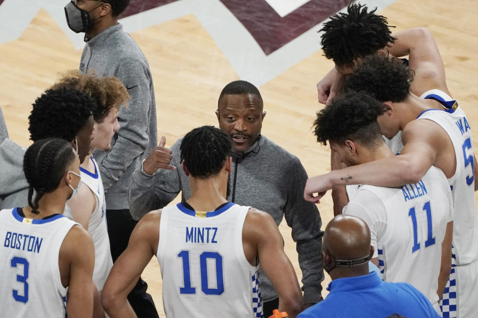 FILE - Kentucky assistant coach James "Bruiser" Flint speaks with the players after stepping in for head coach John Calipari who was tossed out of an NCAA college basketball game against Mississippi State in Starkville, Miss., Saturday, Jan. 2, 2021. Black coaches in the top six men's college basketball leagues are still facing a tough climb in going from assistant to the head job. (AP Photo/Rogelio V. Solis, File)