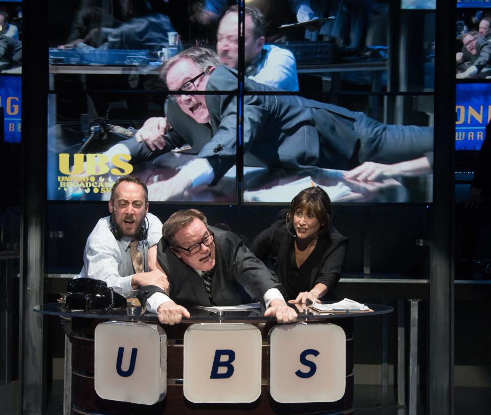 Jason Pintar, left, Sheffield Chastain and Rebecka Jones in a scene from Florida Studio Theatre’s production of “Network.”