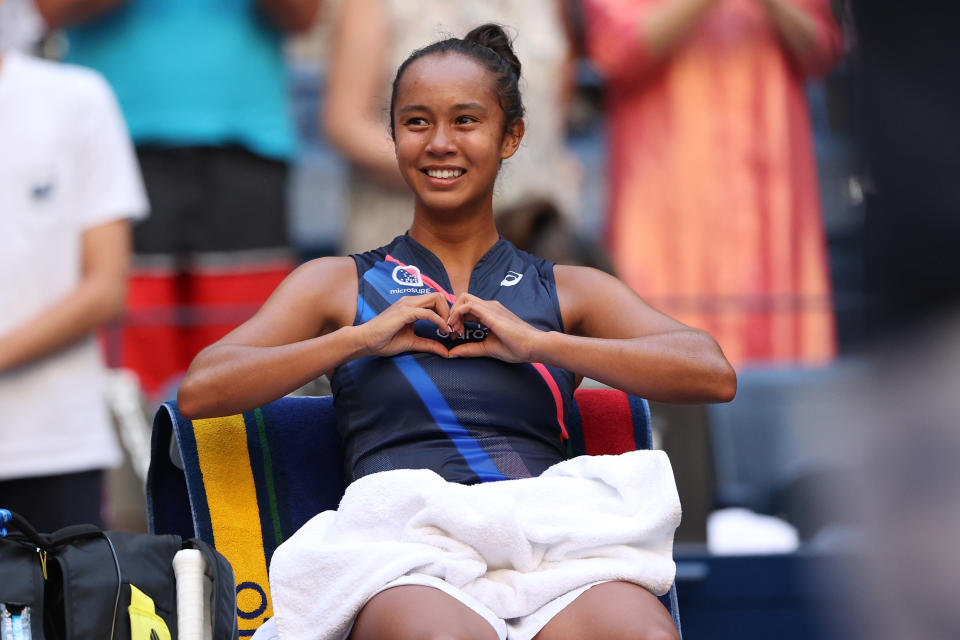 Leylah Fernandez smiles and gestures from the bench after defeating Elina Svitolina in the US Open.