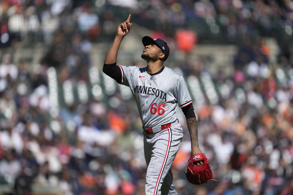 Minnesota Twins pitcher Jorge Alcala (66) celebrates the final out against the Detroit Tigers in the 10th inning during the first baseball game of a doubleheader, Saturday, April 13, 2024, in Detroit. (AP Photo/Paul Sancya)