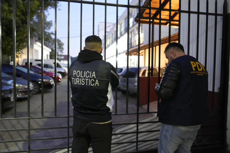 Police arrive at Interpol headquarters to get French rugby players Oscar Jegou and Hugo Auradou for their transfer from Buenos Aires to Mendoza, Argentina, Thursday, July 11, 2024. The players were arrested following a formal complaint filed against them for alleged sexual assault, after France played Argentina in a test rugby match in Mendoza on July 6. (AP Photo/Natacha Pisarenko)