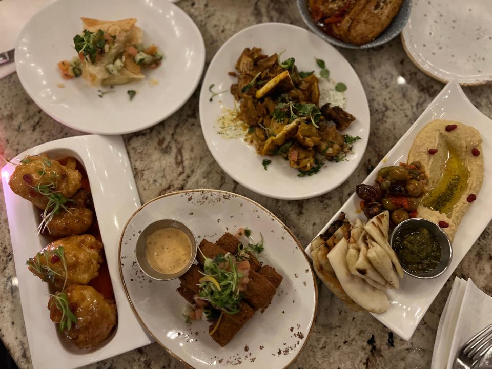 small plates on a table from spice road table at epcot in disney world