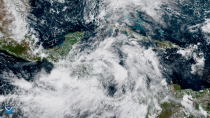 <p>Tropical Storm Nate ashore over Nicaragua on Oct. 5, 2017. <br>GOES-16 captured this geocolor image of Tropical Storm Nate on October 5, 2017. The center of Nate is inland over northeastern Nicaragua, and little change in strength is expected until the center moves over the northwestern Caribbean Sea. After that, a combination of warm sea surface temperatures and light shear should allow for at least steady strengthening. (Photo: NOAA) </p>