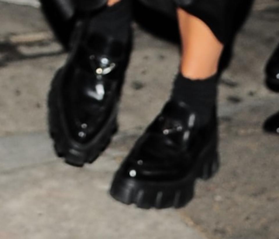 A closer look at Ashlee Simpson’s black Prada Naplak boots. - Credit: twoeyephotos/MEGA