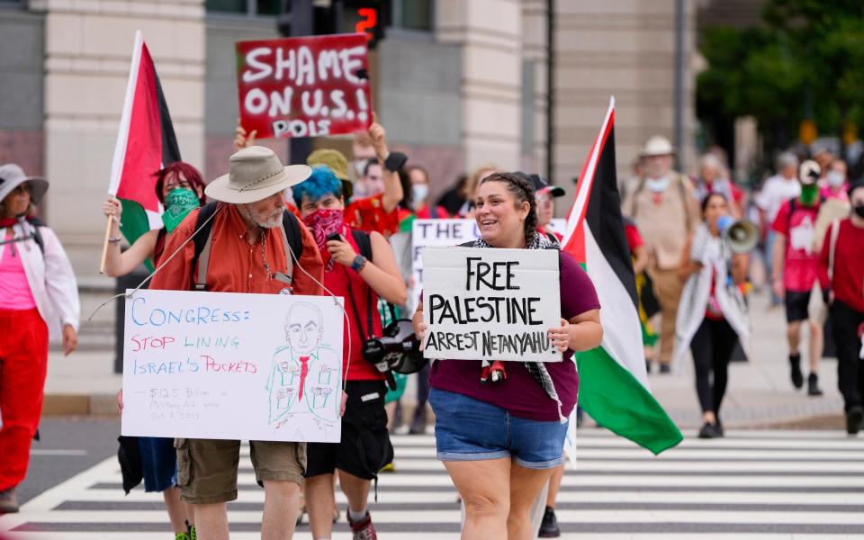 Demonstrators gather near the Capitol ahead of Israeli Prime Minister Benjamin Netanyahu's visit to Washington