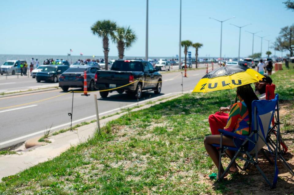 Spring breakers watch traffic during Black Spring Break in Biloxi on Saturday, April 13, 2024.