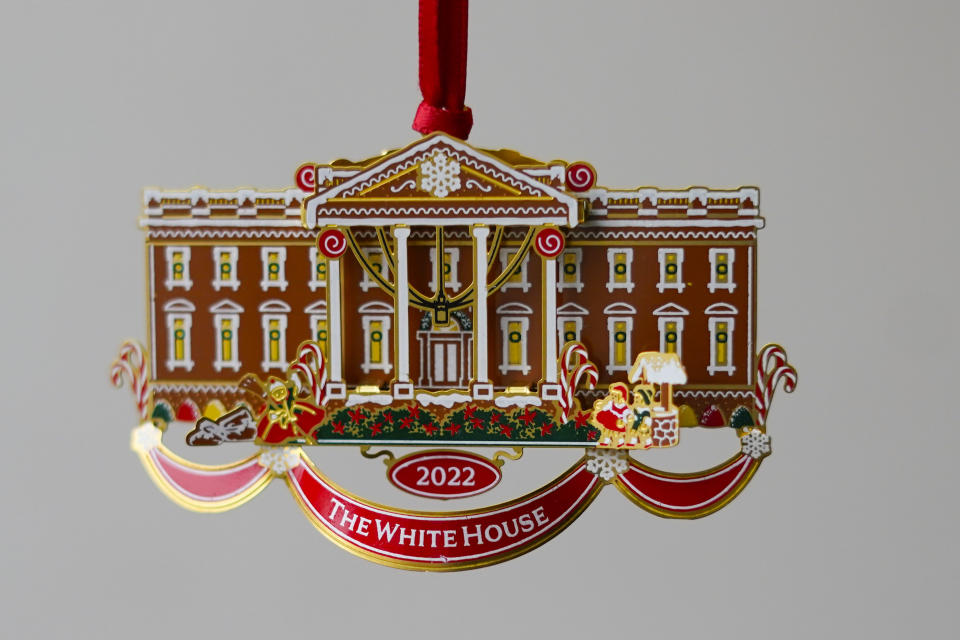 The White House Historical Association's 2022 Christmas Ornament, Tuesday, Dec 6, 2022 in Washington. The annual tree ornament is honors President Richard M. Nixon's administration and a nod to first lady Pat Nixon who first put a gingerbread house on display in the State Dining Room for the holiday season at the White House, long before its talented pastry chefs began making hundred-pound replicas of the executive mansion. (AP Photo/Pablo Martinez Monsivais)