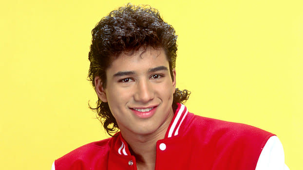 A.C. Slater, played by Mario Lopez, was one character from <em>Saved By the Bell</em> whose shirtless posters wallpapered childhood rooms. (Photo: InStyle)