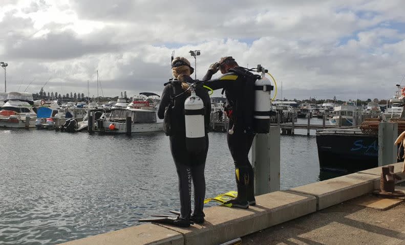 Two divers ready to jump into the harbour. Source: Lisa Jane Hills